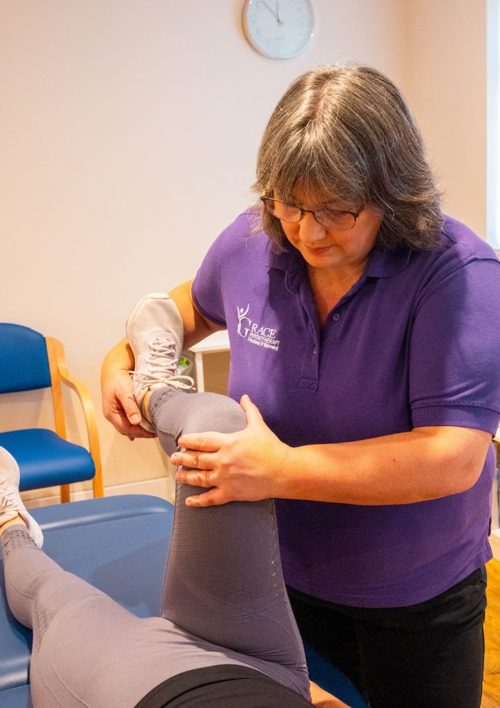 Jo Grace performing Physiotherapy
